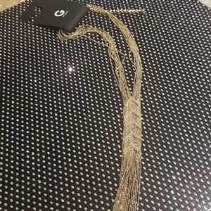 Gold Guess necklace. Rhinestone accents